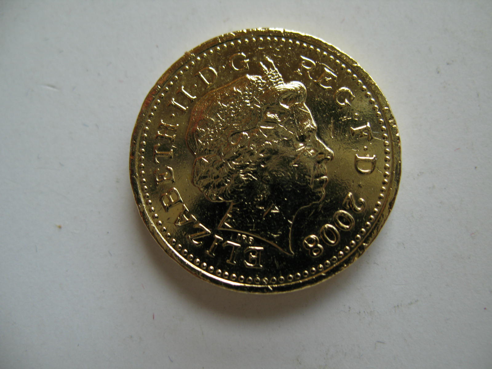 英镑硬币的宏观拍摄高清摄影大图-千库网